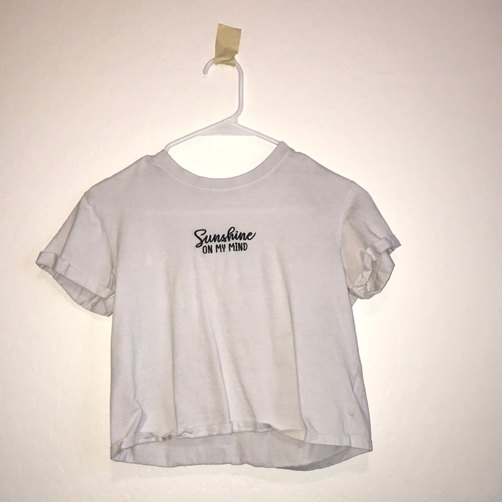 cute tee shirt with flower on back